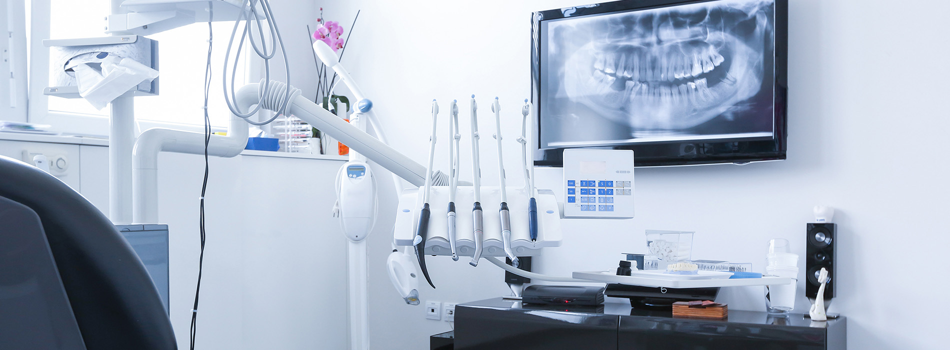 An image of a professional dental office with modern equipment and a clean, organized appearance.